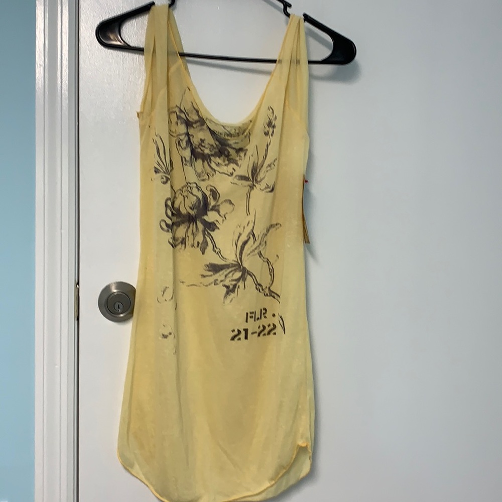 We the Free size L small holes on front not sure if intentional